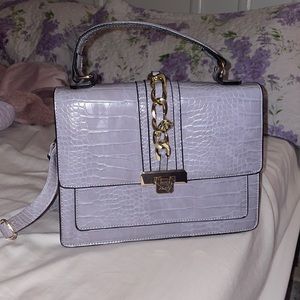 NWOT purple handbag